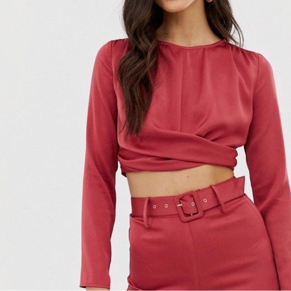 The Girlcode Satin Long Sleeve Crop Top with Twist Detail in Cranberry - Picture 1 of 6